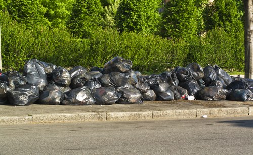 Business personnel using a commercial skip in Edmonton