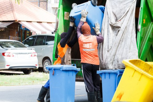 Professional garden waste removal service in action
